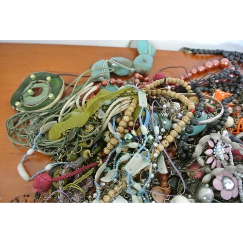 107 - A large assortment of costume jewellery.