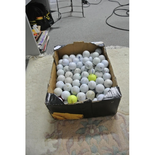 139 - A large assortment of golf balls.