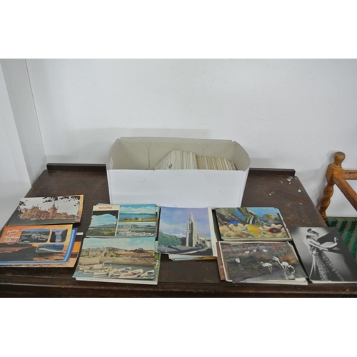 146 - A large collection of various vintage postcards.