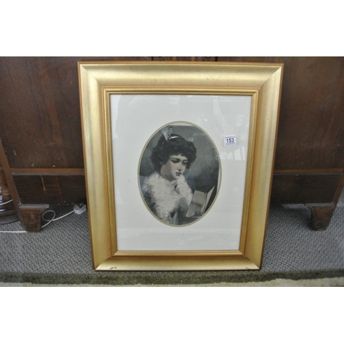 153 - A vintage framed print of a lady reading a programme.