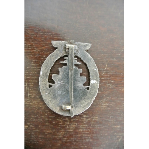 179 - A reproduction WW2 era German military badge.