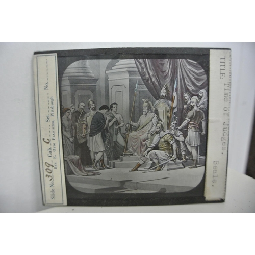 180 - A collection of vintage magic lantern slides produced by Maison de la Bonne Presco.