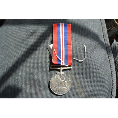 185 - Two war medals.