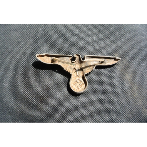 190 - A reproduction WW2 Era German officer cap badge.