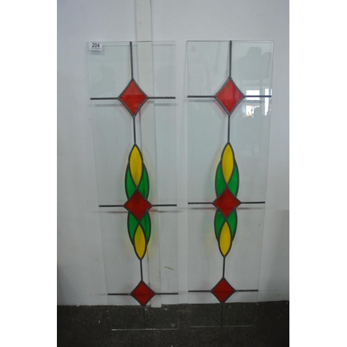 204 - Two stunning stained glass panels.