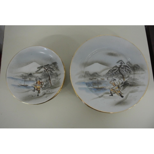 207 - A hand painted Oriental tea service each piece signed at the base.