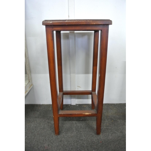 214 - A wooden plant stand.