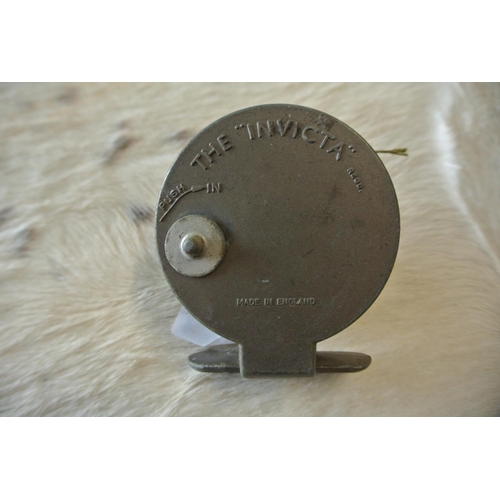 218 - The 'INVICTA' fishing reel, along with a 'RYOBI' fishing reel.