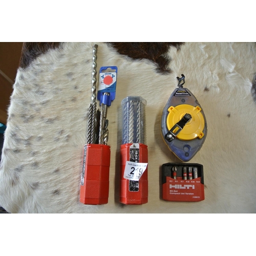 219 - An assortment of high quality Hilti drill bits, along with a Stanley Power Winder.