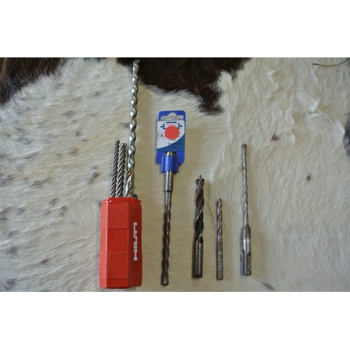 219 - An assortment of high quality Hilti drill bits, along with a Stanley Power Winder.