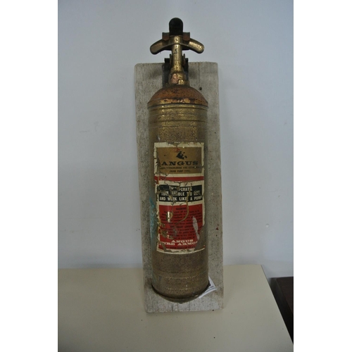 225 - A vintage hand pump fire extinguisher produced by 'Angus'.