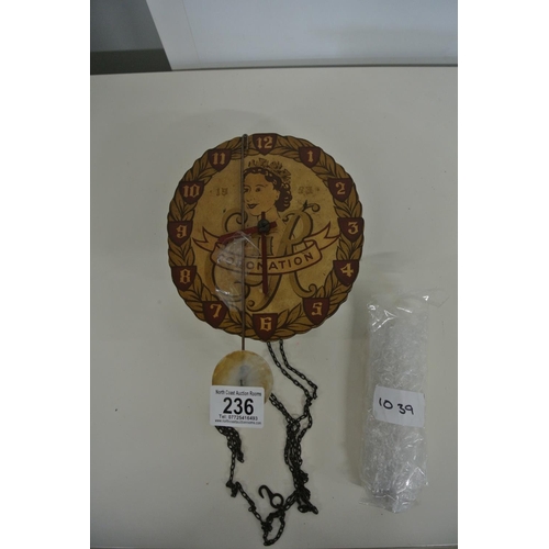 236 - An unusual Coronation wall hanging pendulum clock.