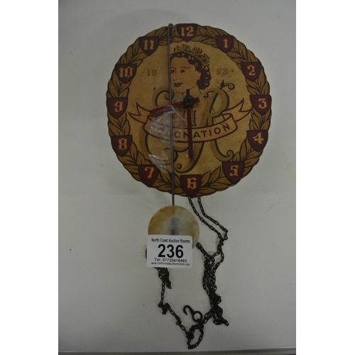 236 - An unusual Coronation wall hanging pendulum clock.