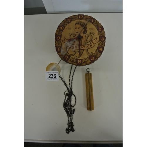 236 - An unusual Coronation wall hanging pendulum clock.