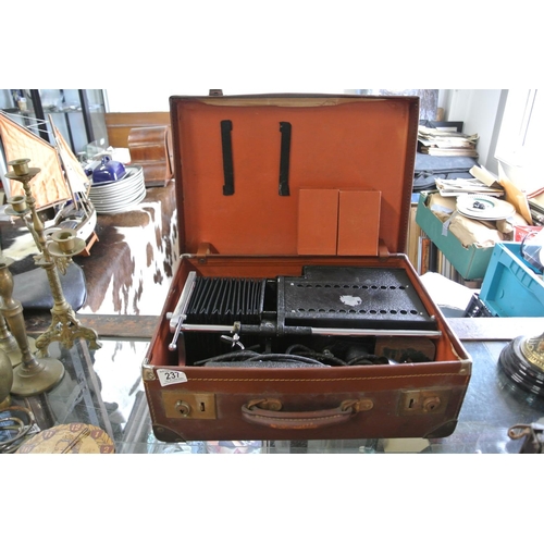 237 - A vintage / antique Ensign-Optiscope No 9 magic lantern projector in original leather carry case. Co... 