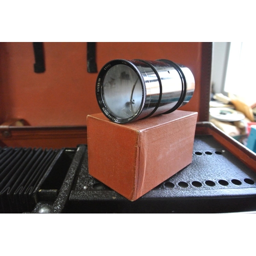 237 - A vintage / antique Ensign-Optiscope No 9 magic lantern projector in original leather carry case. Co... 