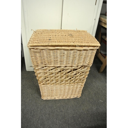 241 - A wicker laundry basket.