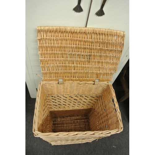 241 - A wicker laundry basket.