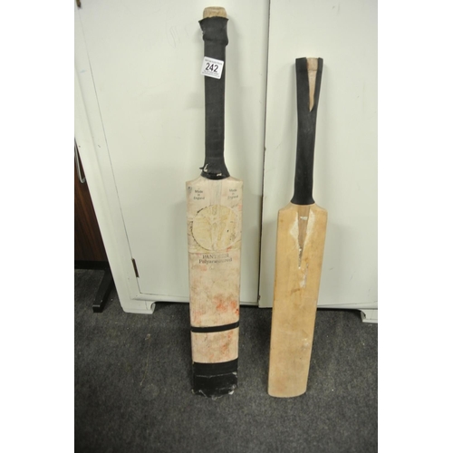 242 - Two cricket bats.