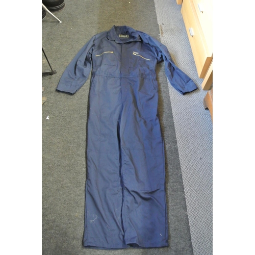 250 - A Super Champion boiler suit along with a pair of Blue Castle workman's trousers.