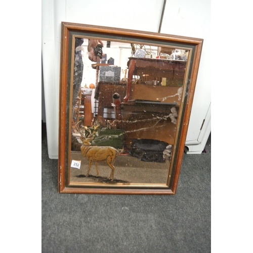 252 - A retro mirror with stag details.