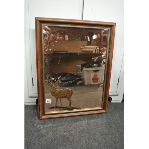 252 - A retro mirror with stag details.