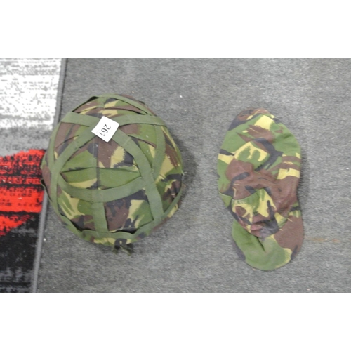 261 - An assortment of army gear to include a combat helmet and more.