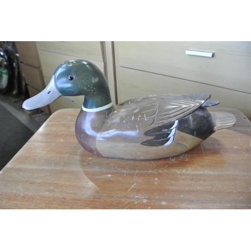 264 - A wooden model of a duck.