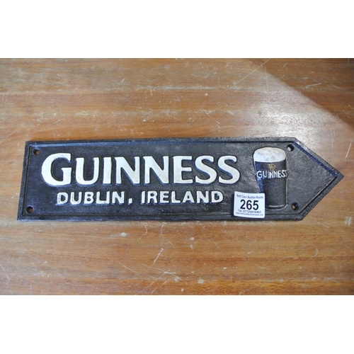 265 - A reproduction cast iron sign reading, 'Guinness Dublin Ireland'.