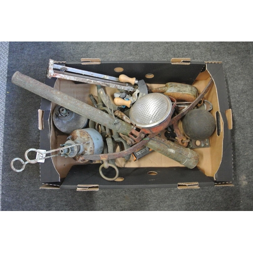 275 - An assortment of items to include vintage rollicks / boat locks, oil lamps bases and more.