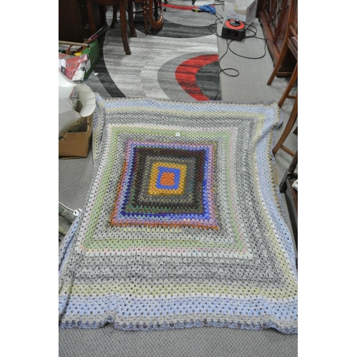 299 - A vintage hand woven wool throw / blanket.