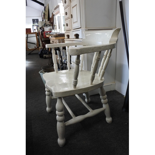 301 - An antique bow back smokers chair, painted white.