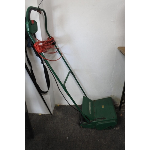 302 - A Qualcast electric garden scarifier.