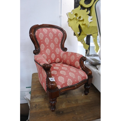 303 - A stunning antique style miniature armchair.