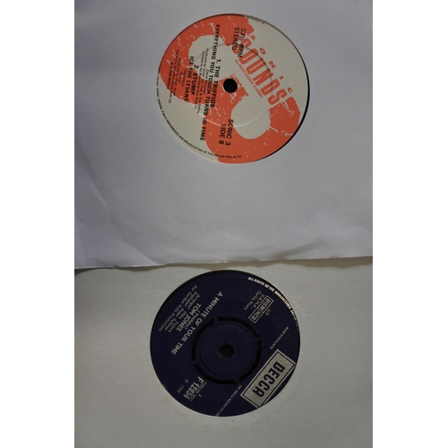 318 - An assortment of various singles/ 45's to include Yello, Tom Jones & more.