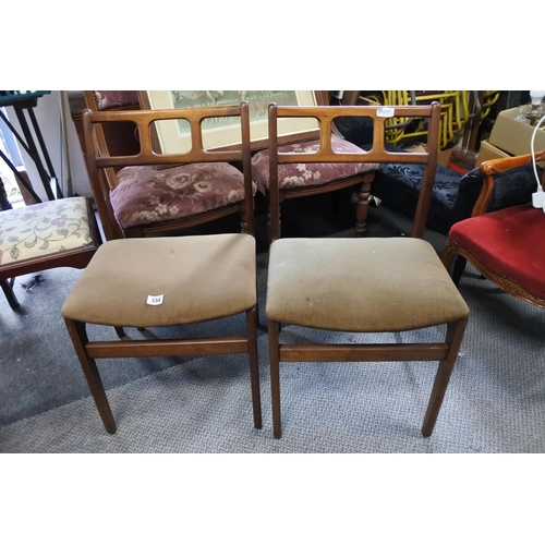 334 - A pair of vintage/ retro dining chairs.