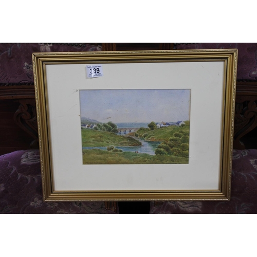 339 - A small framed painting of a countryside scene signed to base.