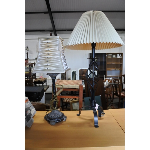 351 - A large collection of modern lamps.