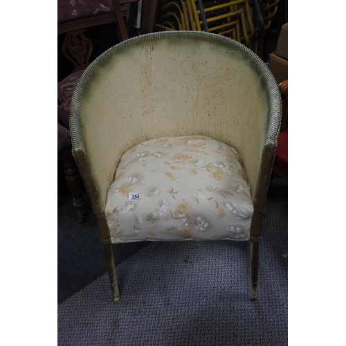 354 - A Lloyd Loom style bedroom chair.