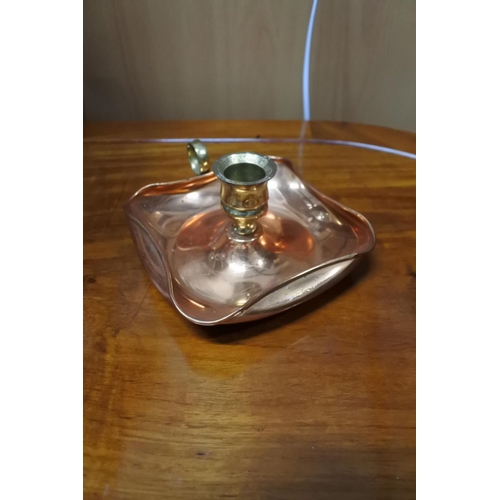 361 - A copper & brass candlestick holder.