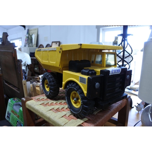 369 - A Matchbox yellow dump truck.