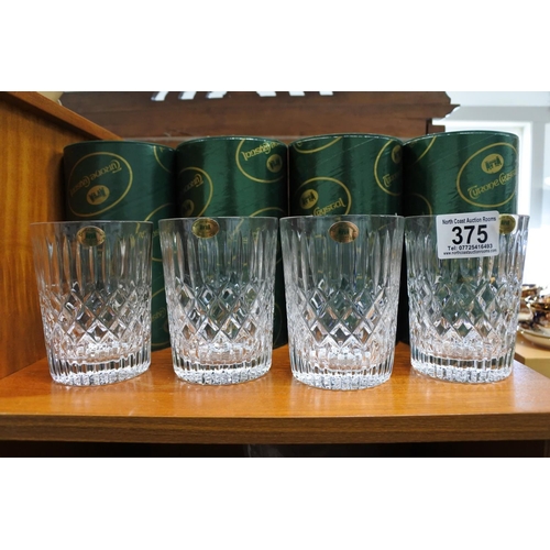 375 - A stunning set of four Tyrone crystal glasses complete with original packaging.