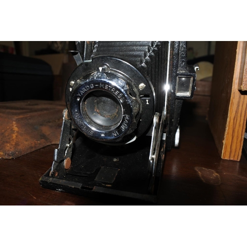 384 - A vintage Ross Ensign Selfix Snapper folding camera.