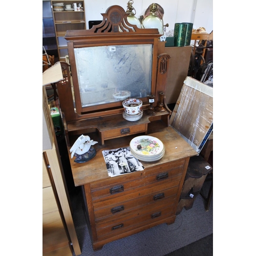 394 - A stunning vintage dressing table with four drawers, a bevelled glass mirror and nicely carved detai... 