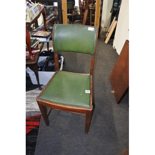 412 - A vintage / antique chair with green leather upholstery.