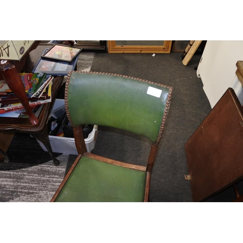 412 - A vintage / antique chair with green leather upholstery.