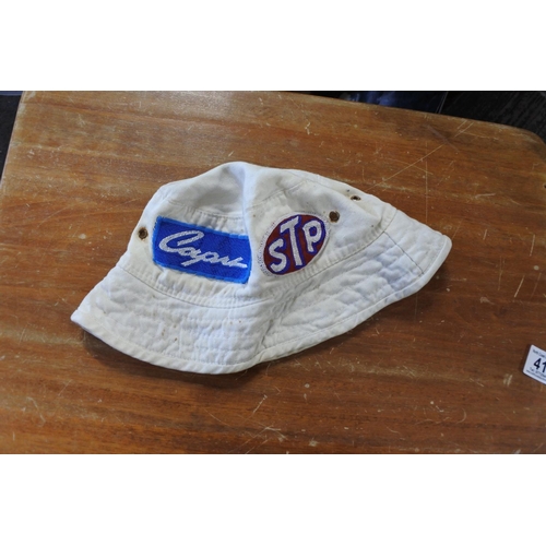 414 - A retro bucket hat with badges stitched on, to include 'STP', Escort', and more.