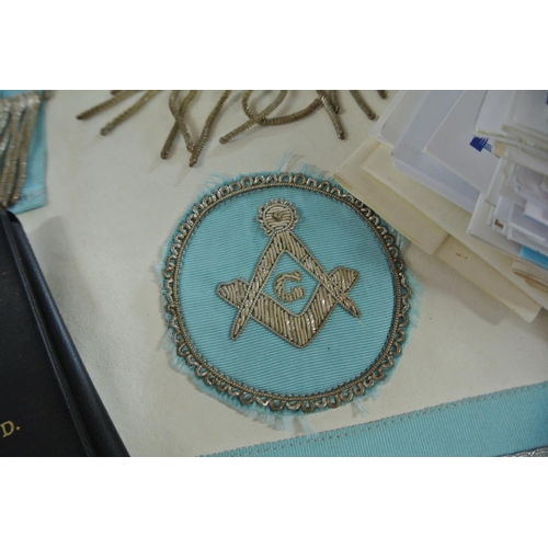 425 - A collection of Masonic Lodge items to include a badge, a presentation bag and a large assortment of... 