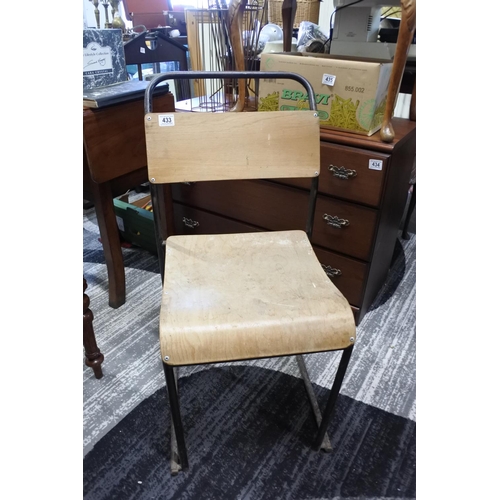 433 - A vintage metal and wood school chair.