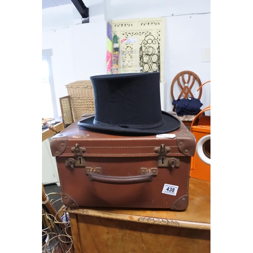 438 - An antique top hat produced by Gerrard Hats Austin Reed Ltd London complete with original leather bo... 